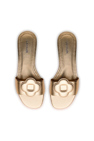 Flora Flat Mule In Gold Metallic Leather