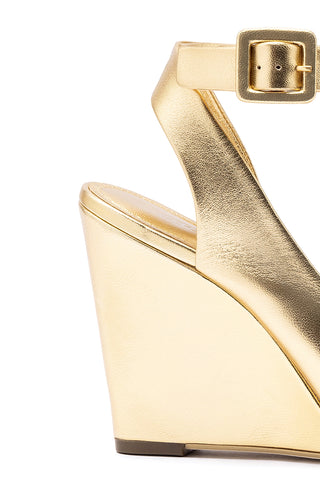 Deena By Larroudé Wedge Sandal In Gold Metallic Leather